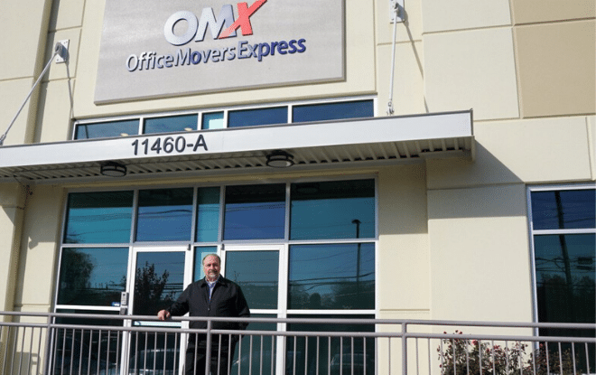 Ed Bacon in front of OMX building